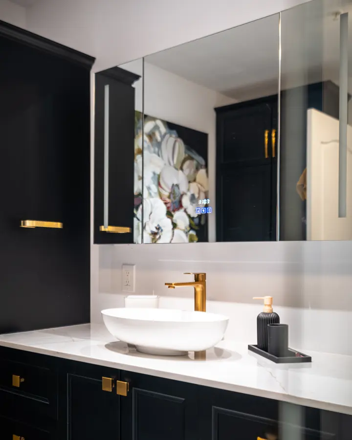 Black vanity with brass fittings