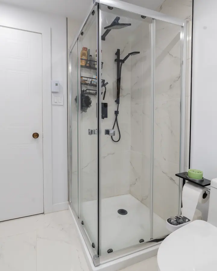 Shower fixture detail on marble